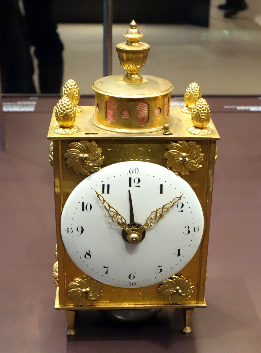 An 18th century gilt travel alarm clock by Christian Ehregott Weisse of Dresden, displayed at the Mathematisch-Physikalischer Salon museum